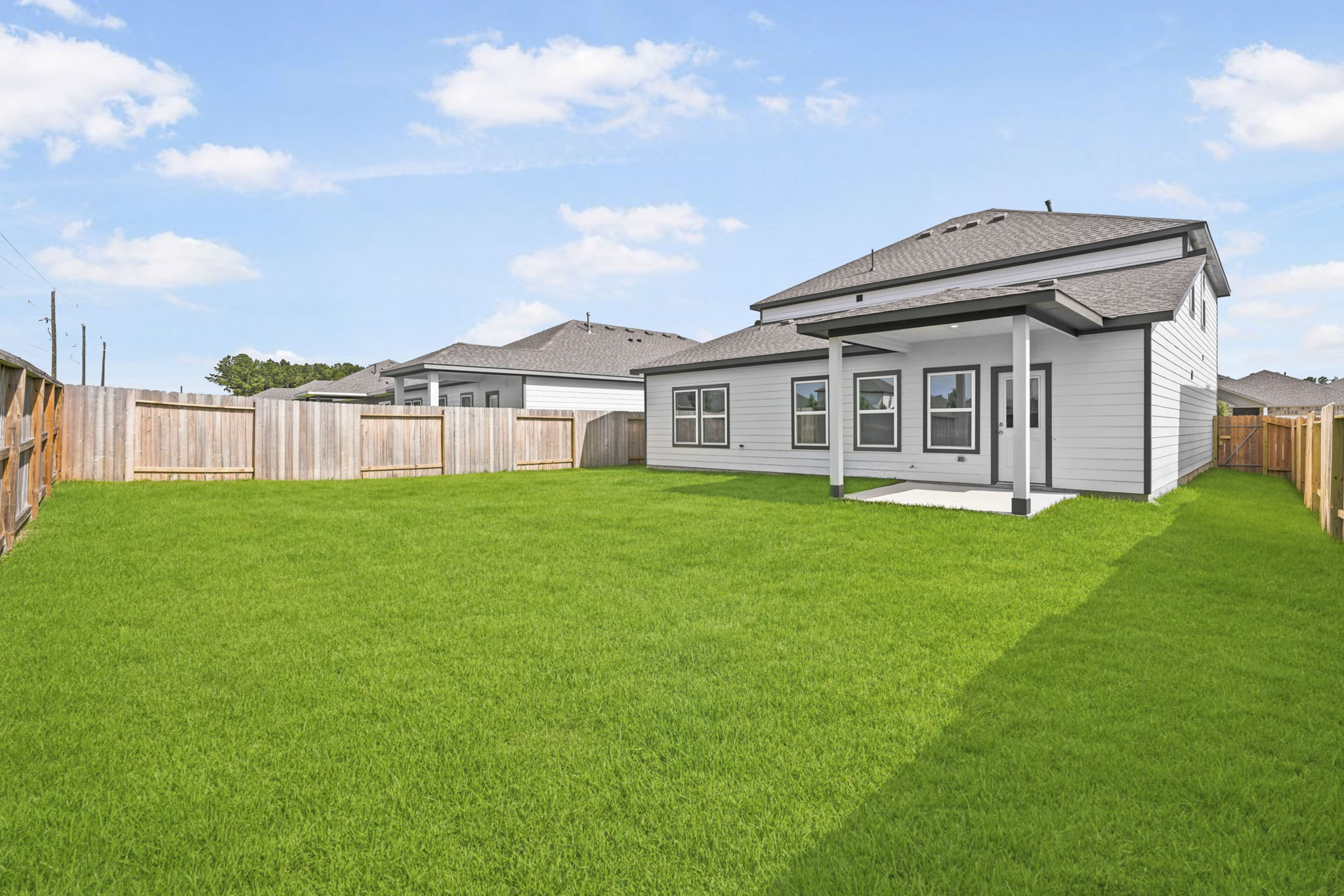 A house with a fence around it.