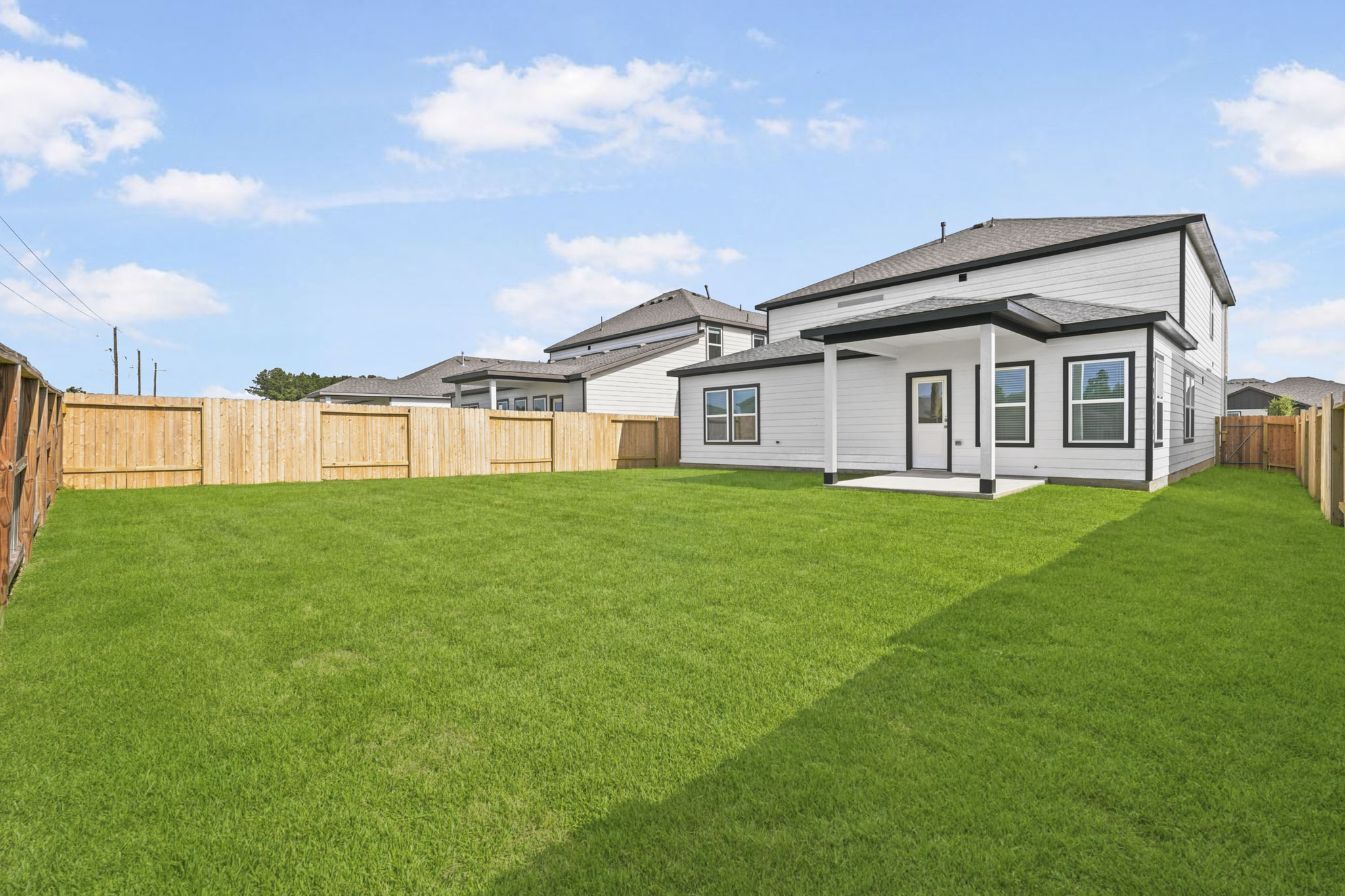 A house with a fence around it.