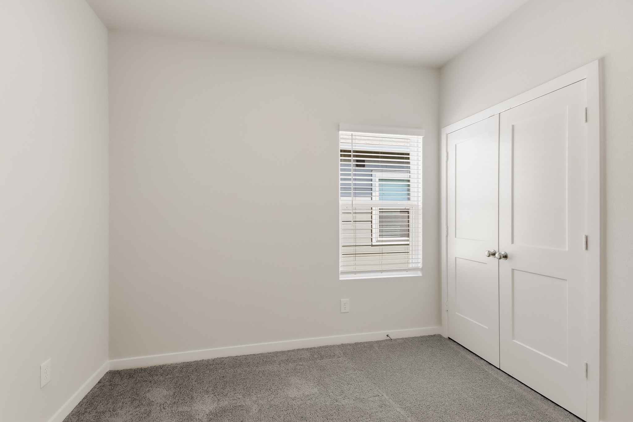A room with white doors.
