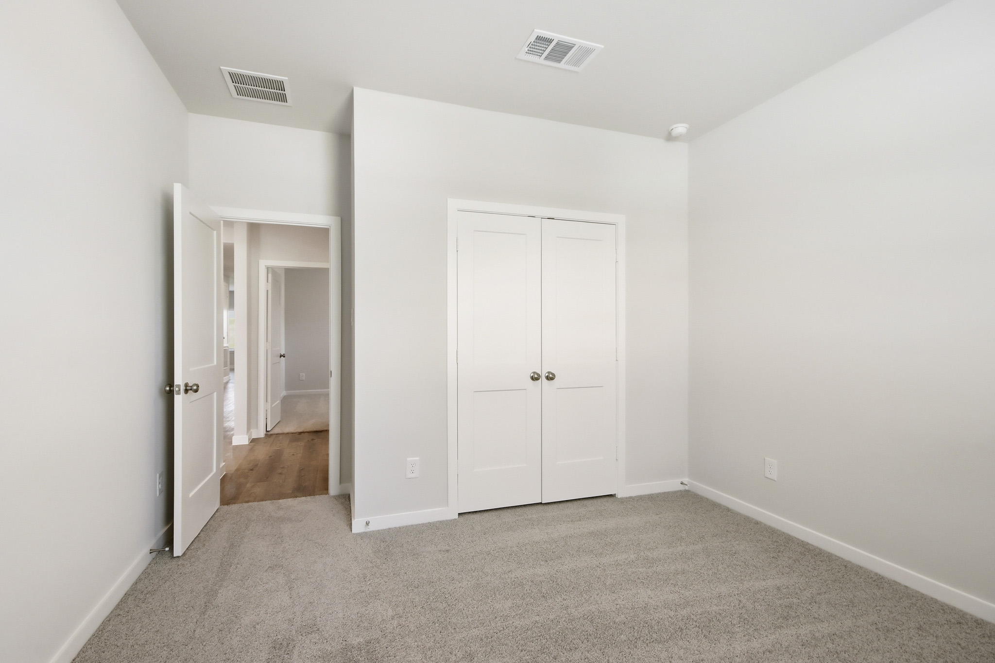 A room with white doors.