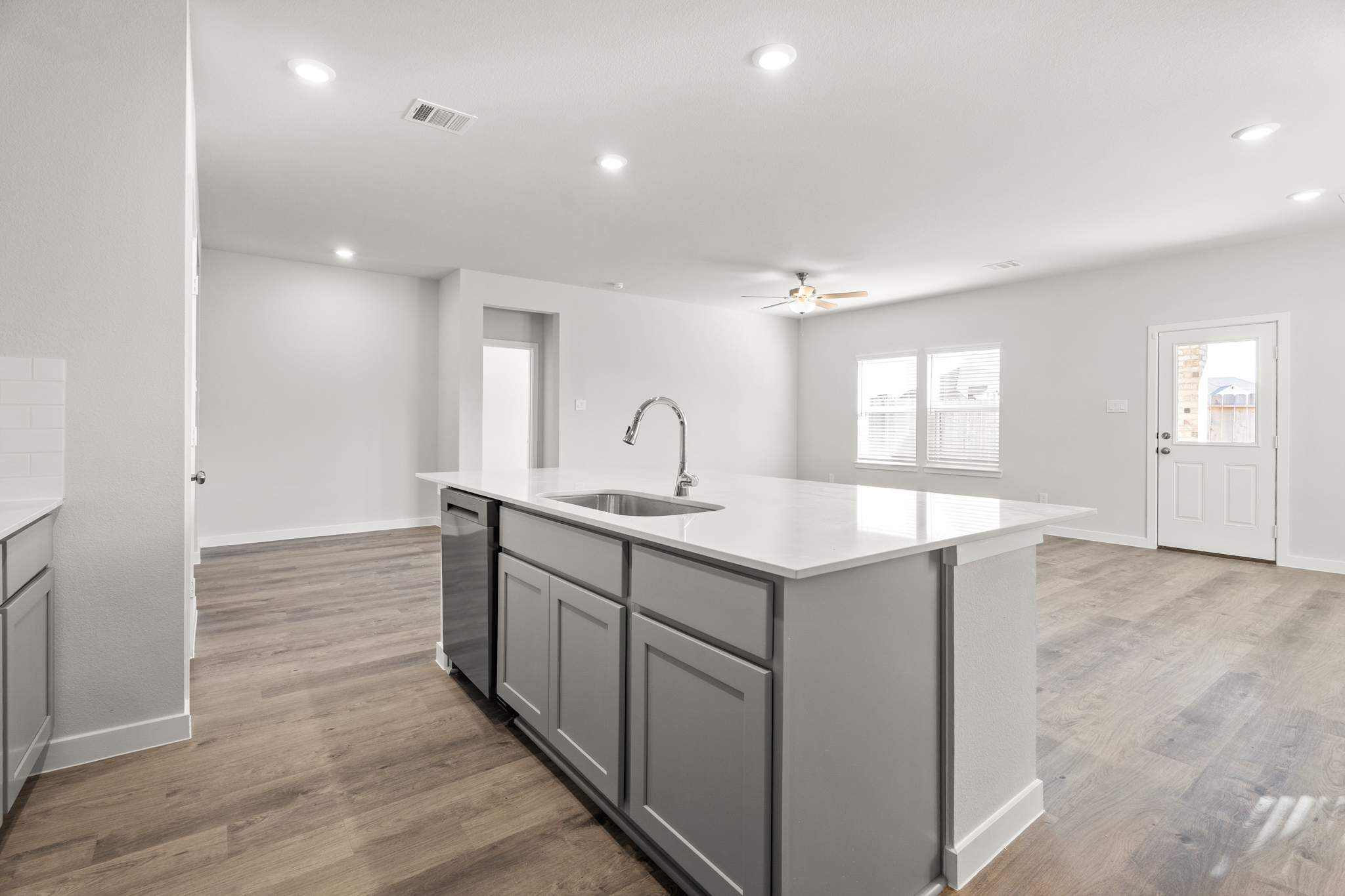 A kitchen with a large island.