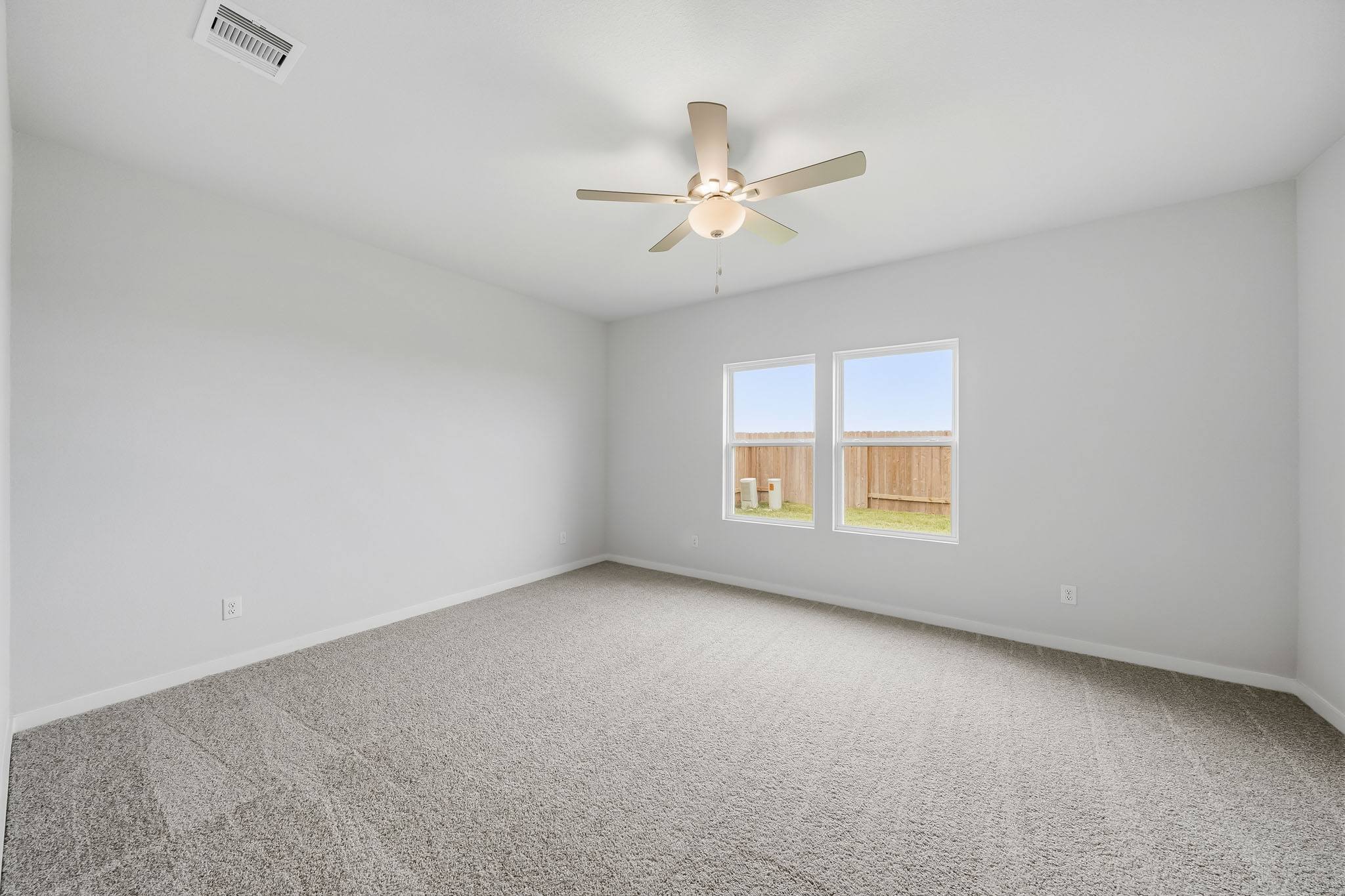 A ceiling fan in a room.