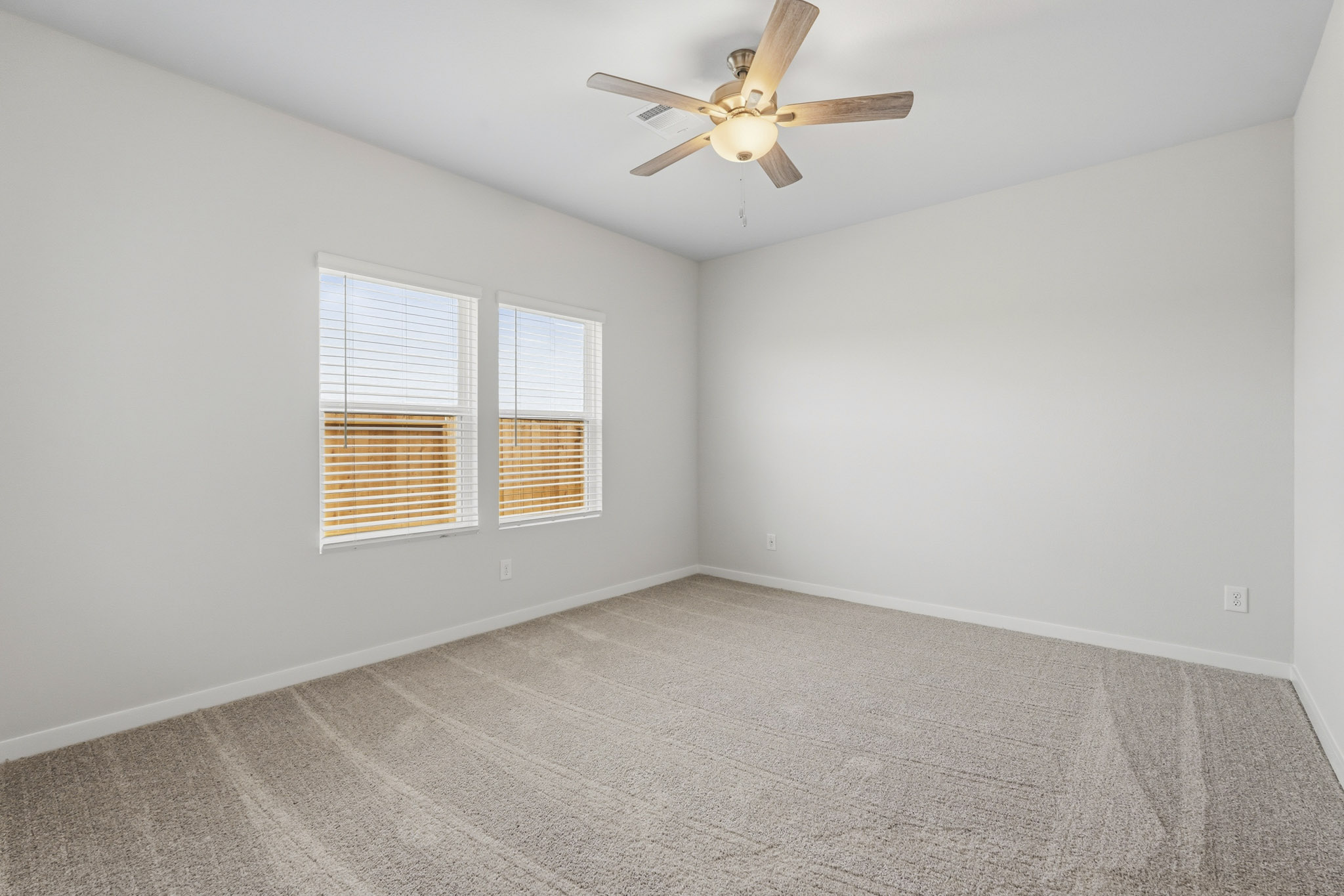 A ceiling fan in a room.
