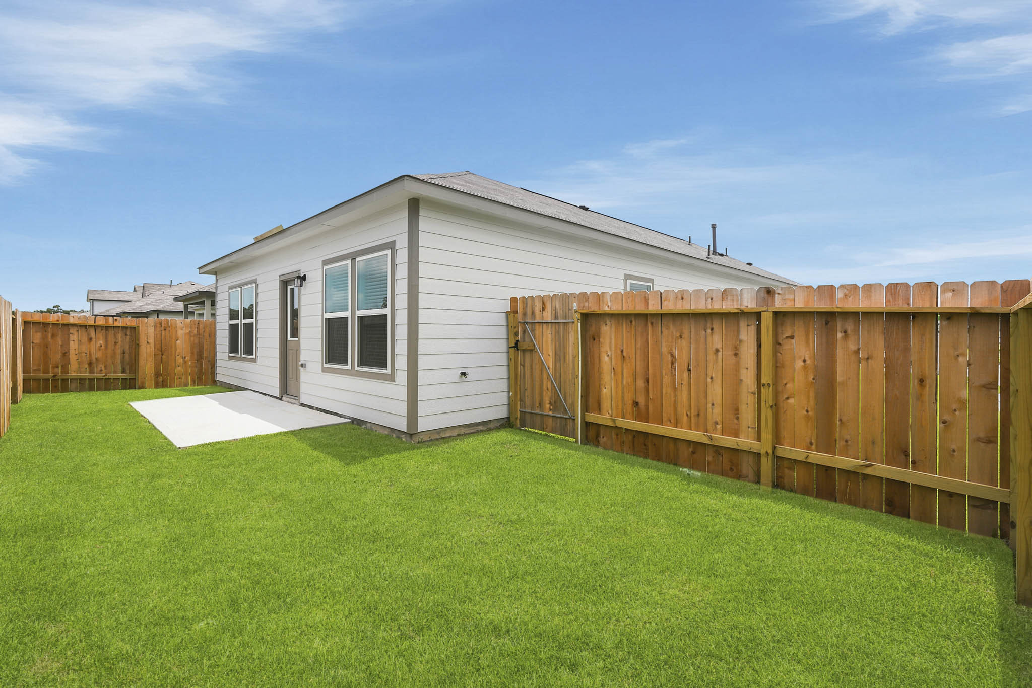 A house with a fence around it.