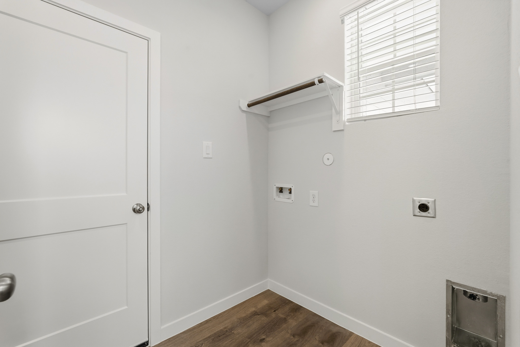 A white door with a window.