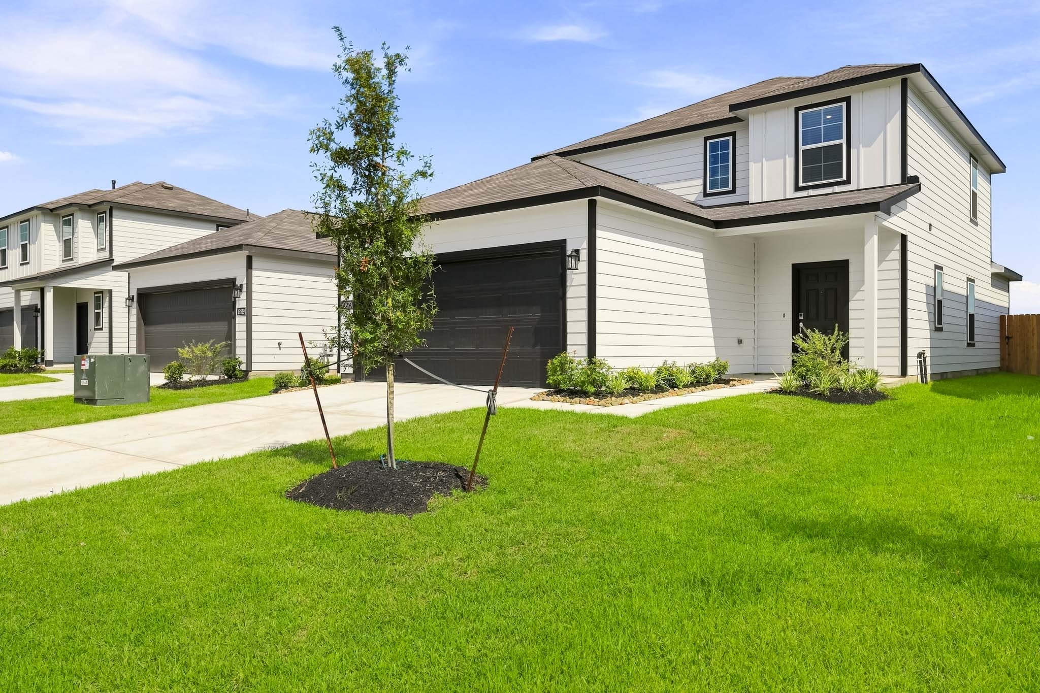 A house with a large front yard.