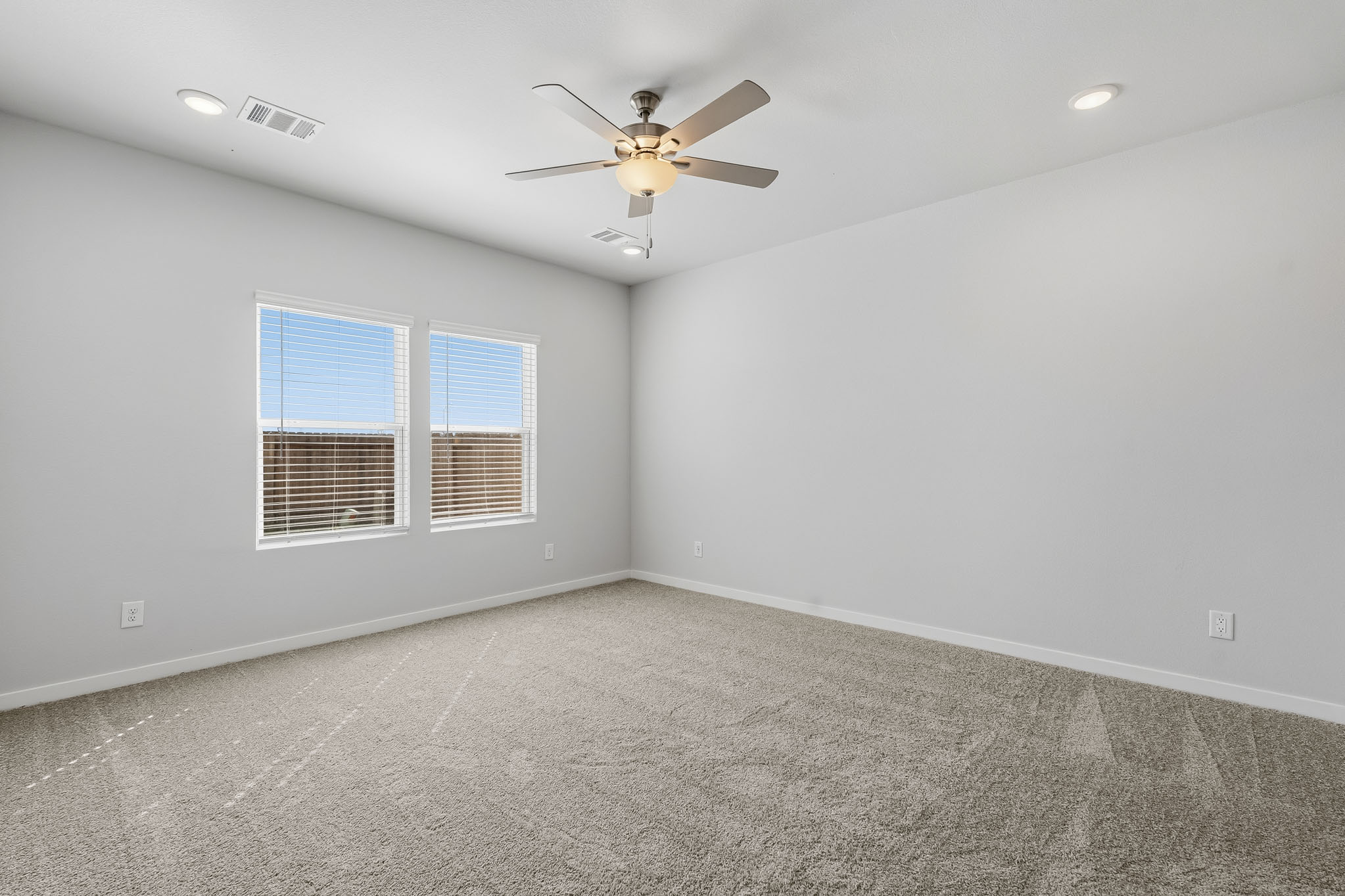 A ceiling fan in a room.