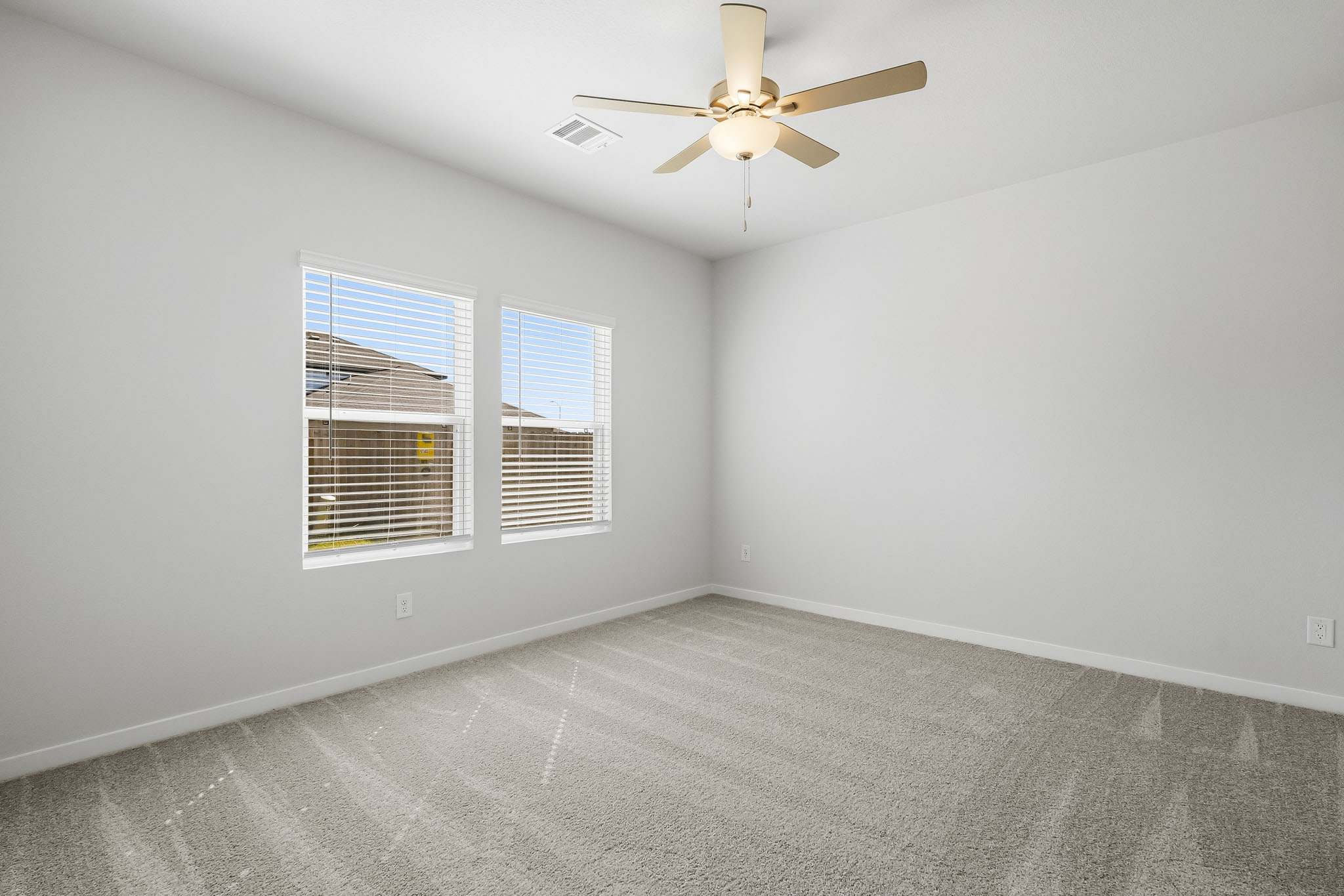 A ceiling fan in a room.