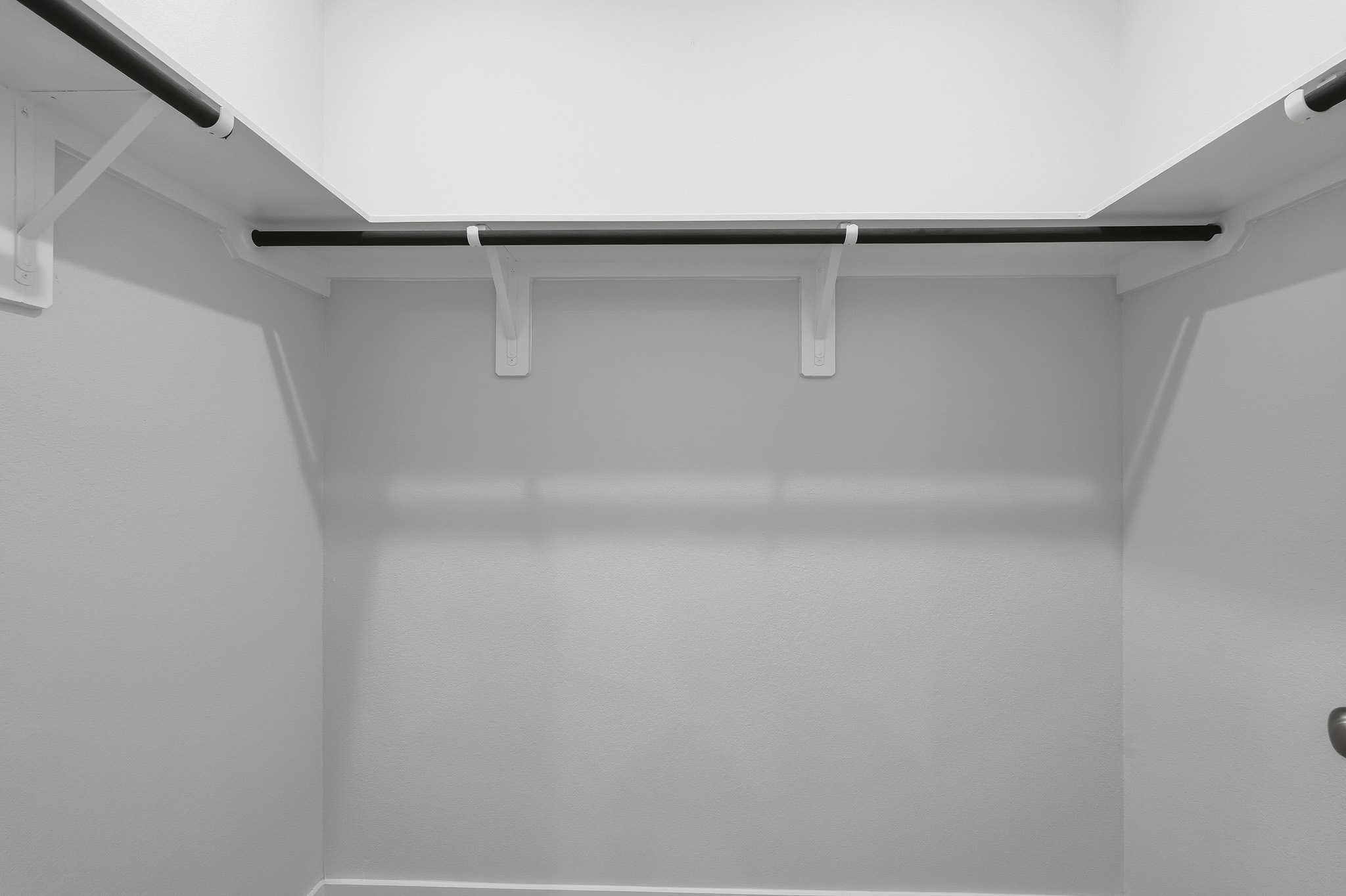 A white ceiling with a light.
