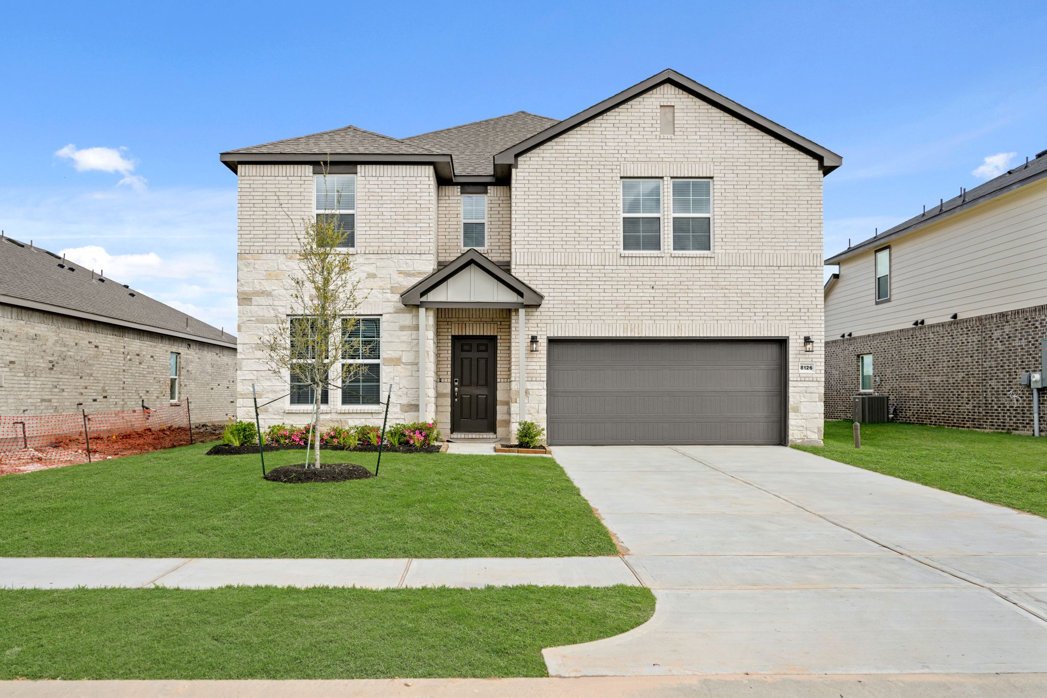 A house with a driveway.