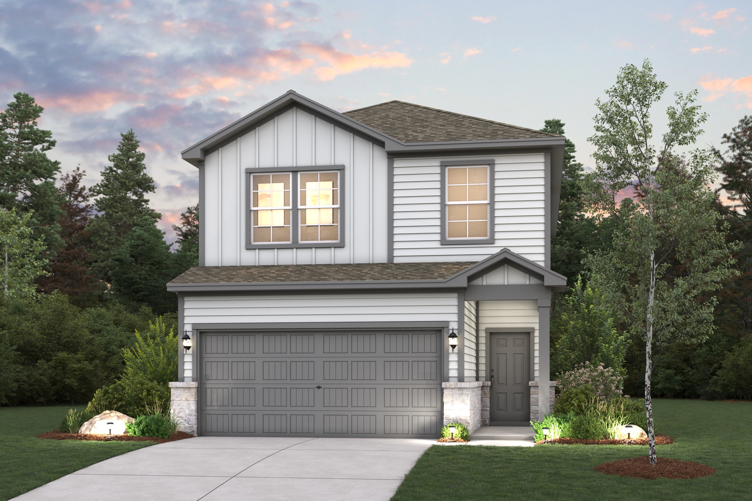 A house with a garage and trees around it.