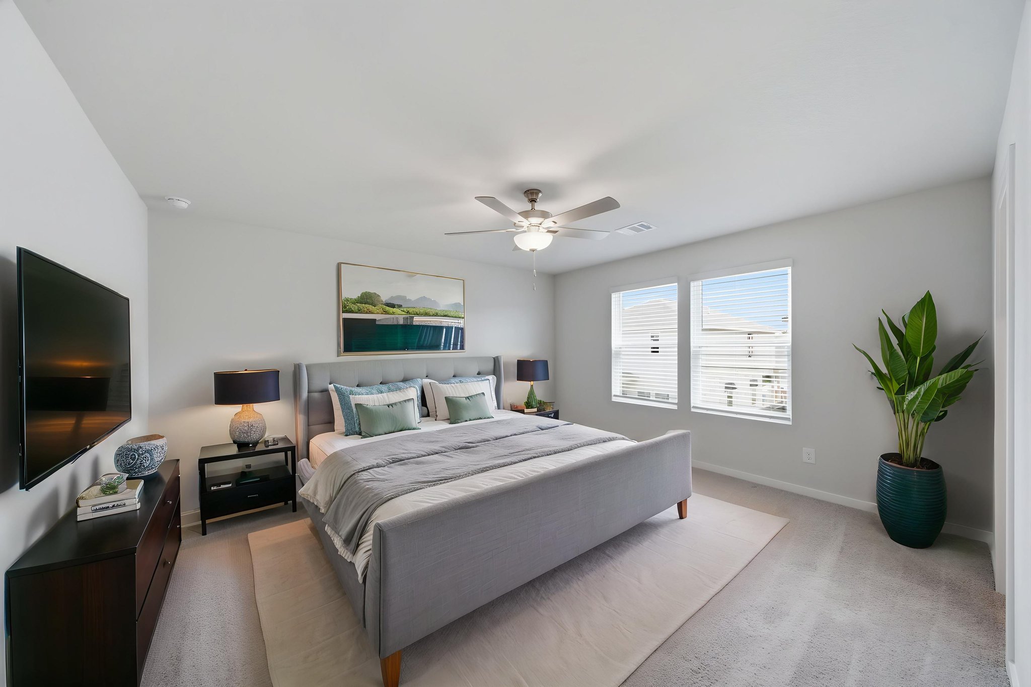 A bedroom with a large bed.