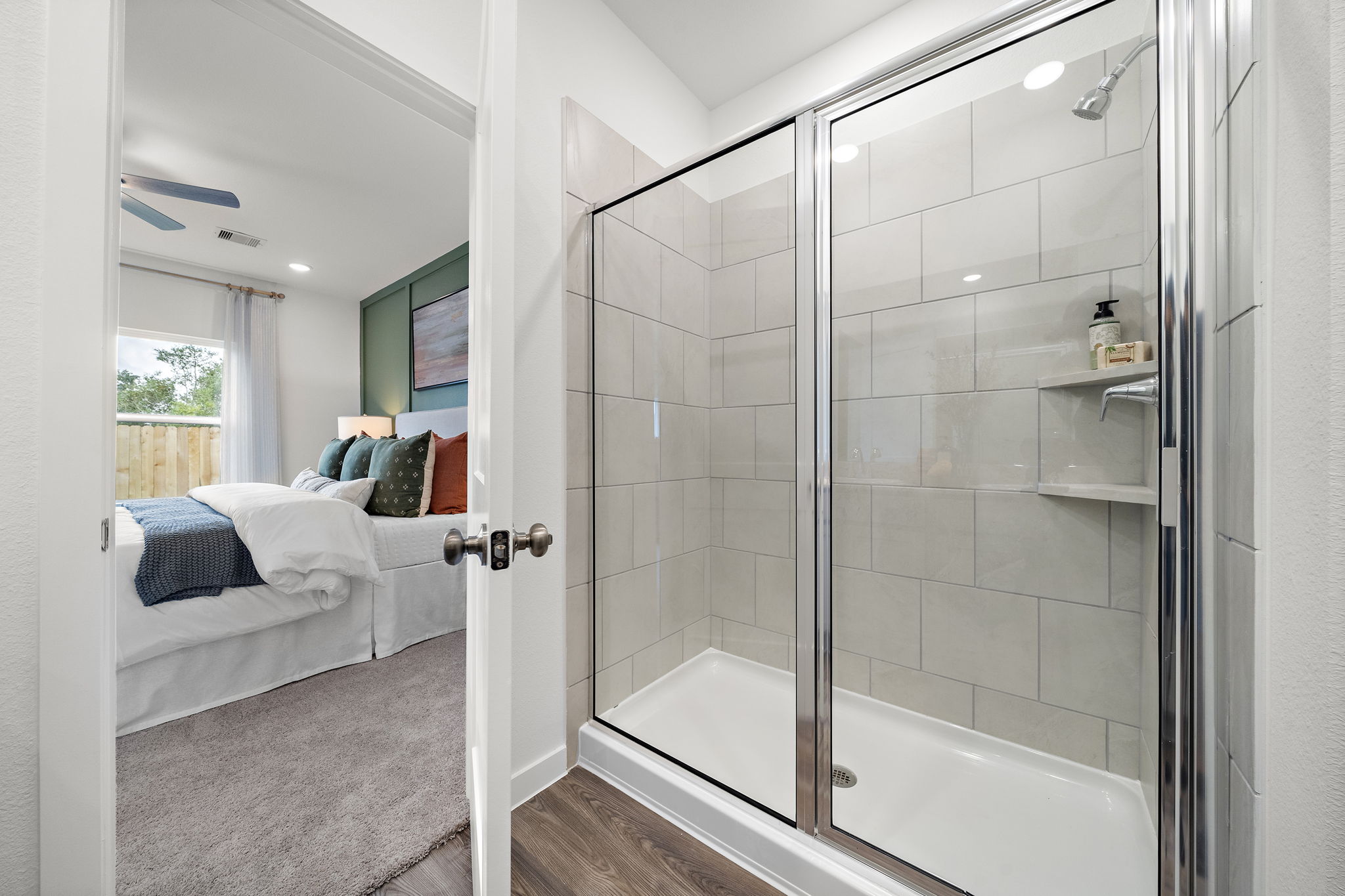 A bathroom with a glass shower.