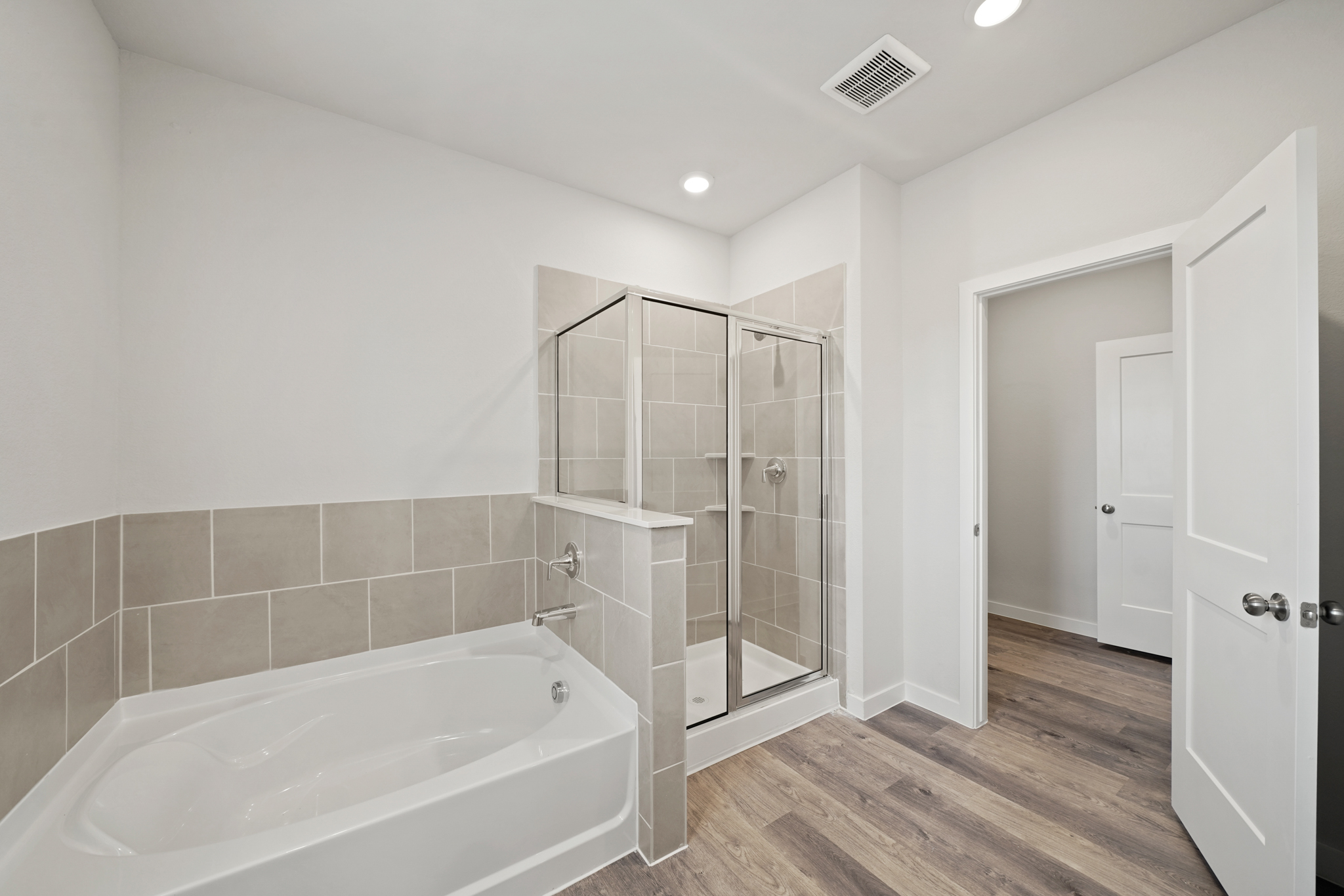 A bathroom with a glass shower.