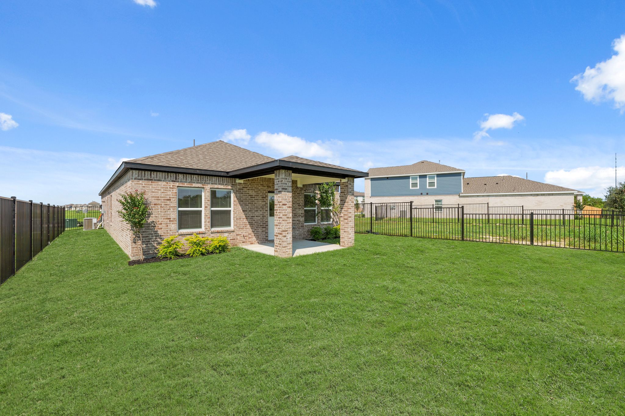 A house with a fence around it.