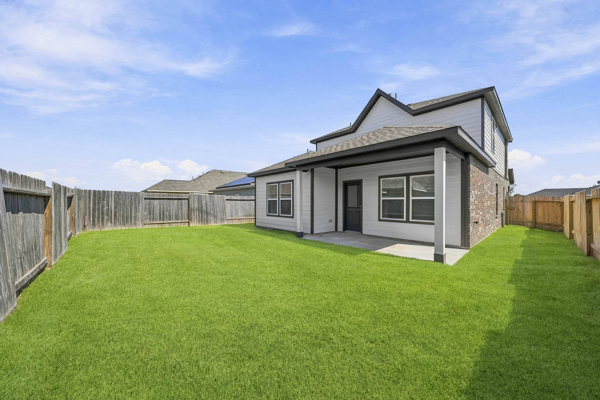 A house with a fence around it.