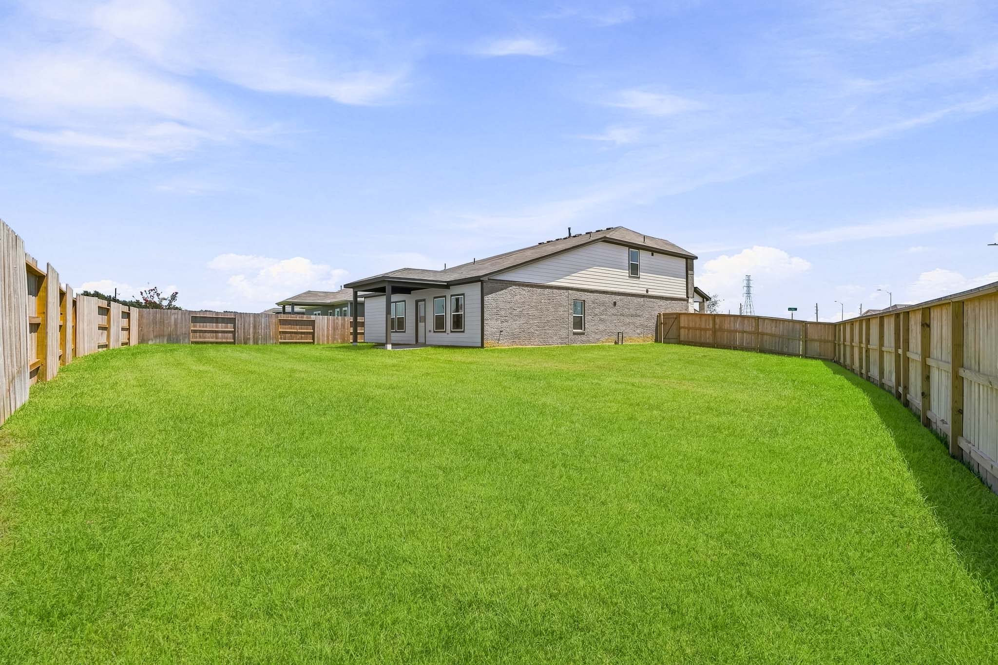 A large green lawn.