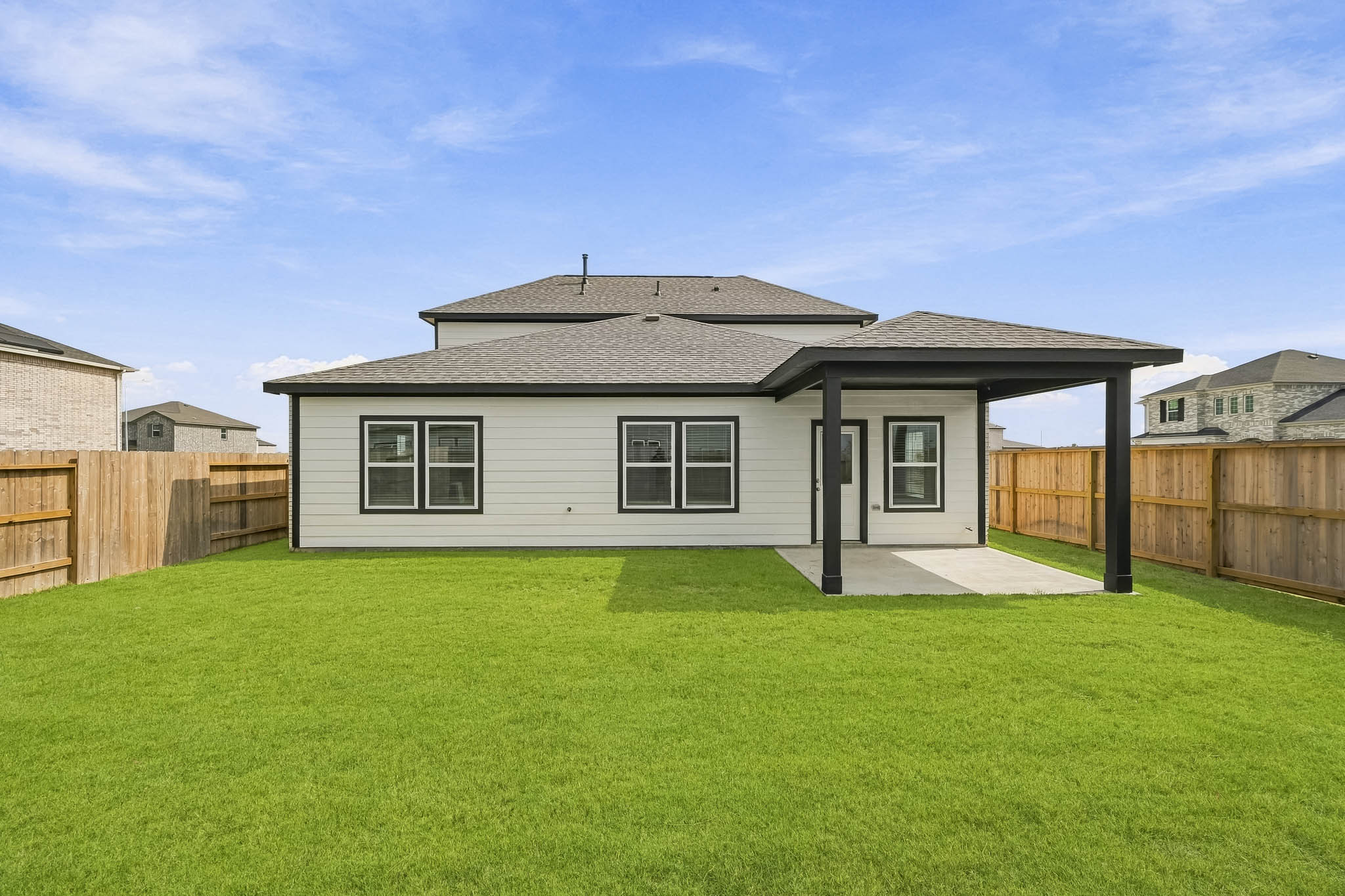 A house with a fence around it.