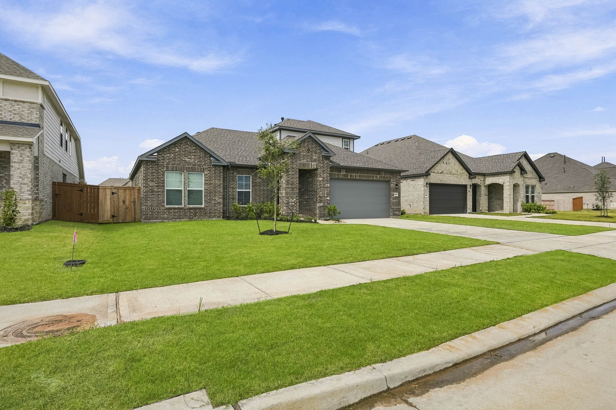 A large house with a lawn.