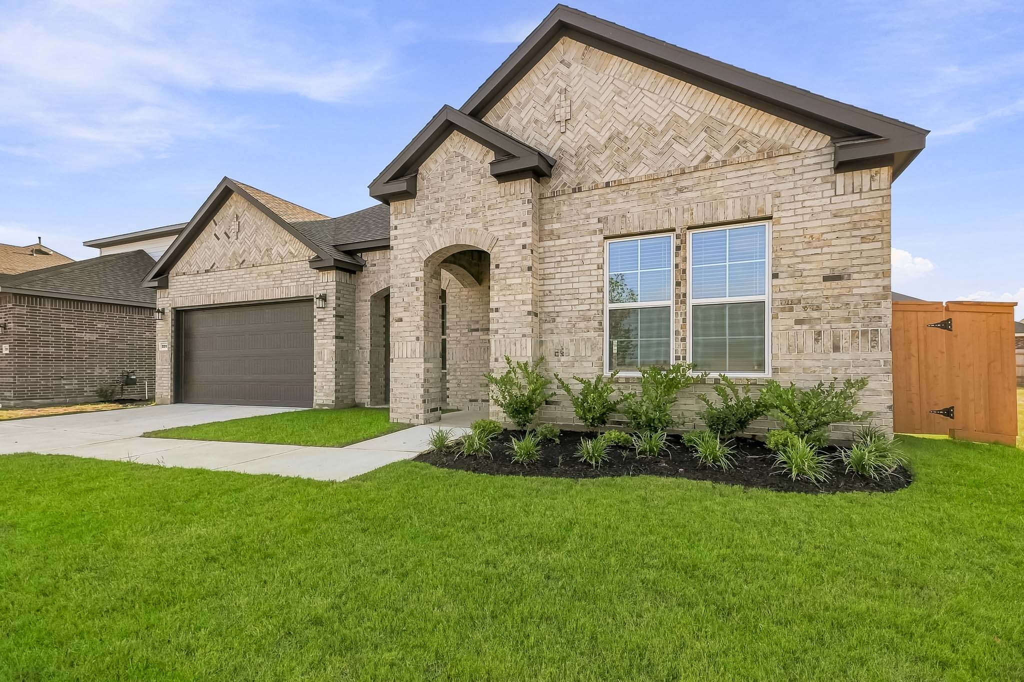 A house with a large front yard.