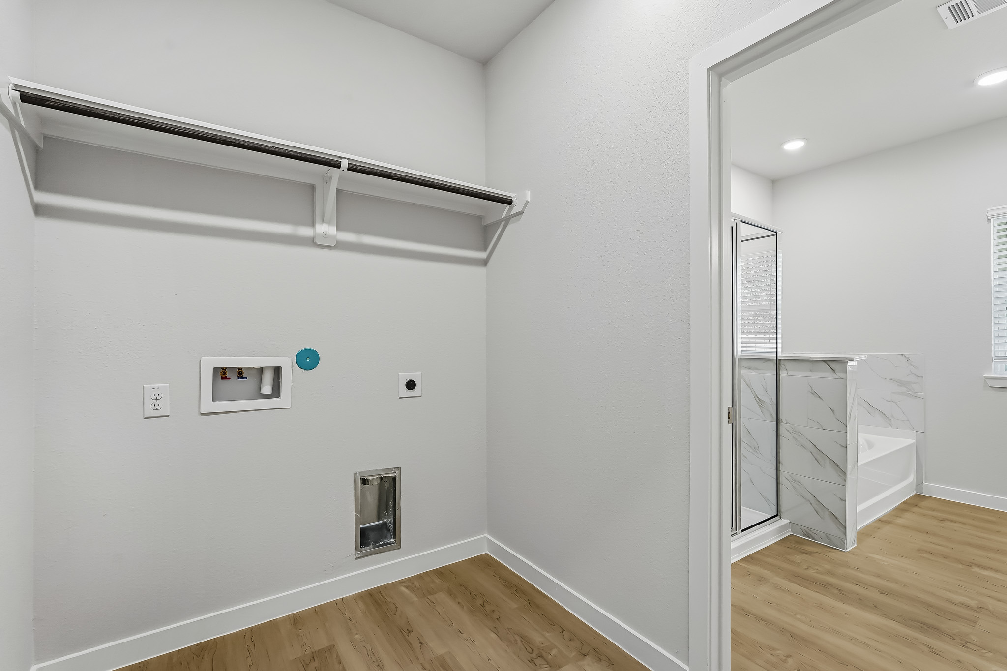 A room with a glass door.