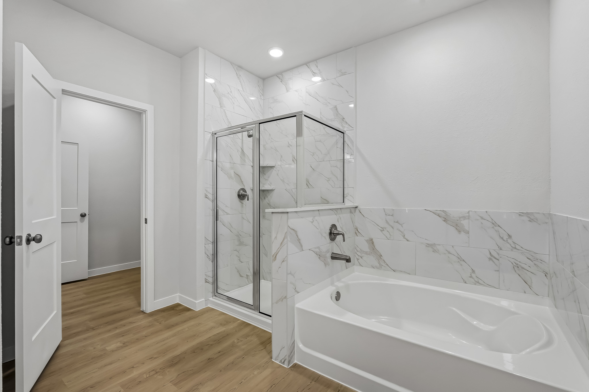 A bathroom with a glass shower.