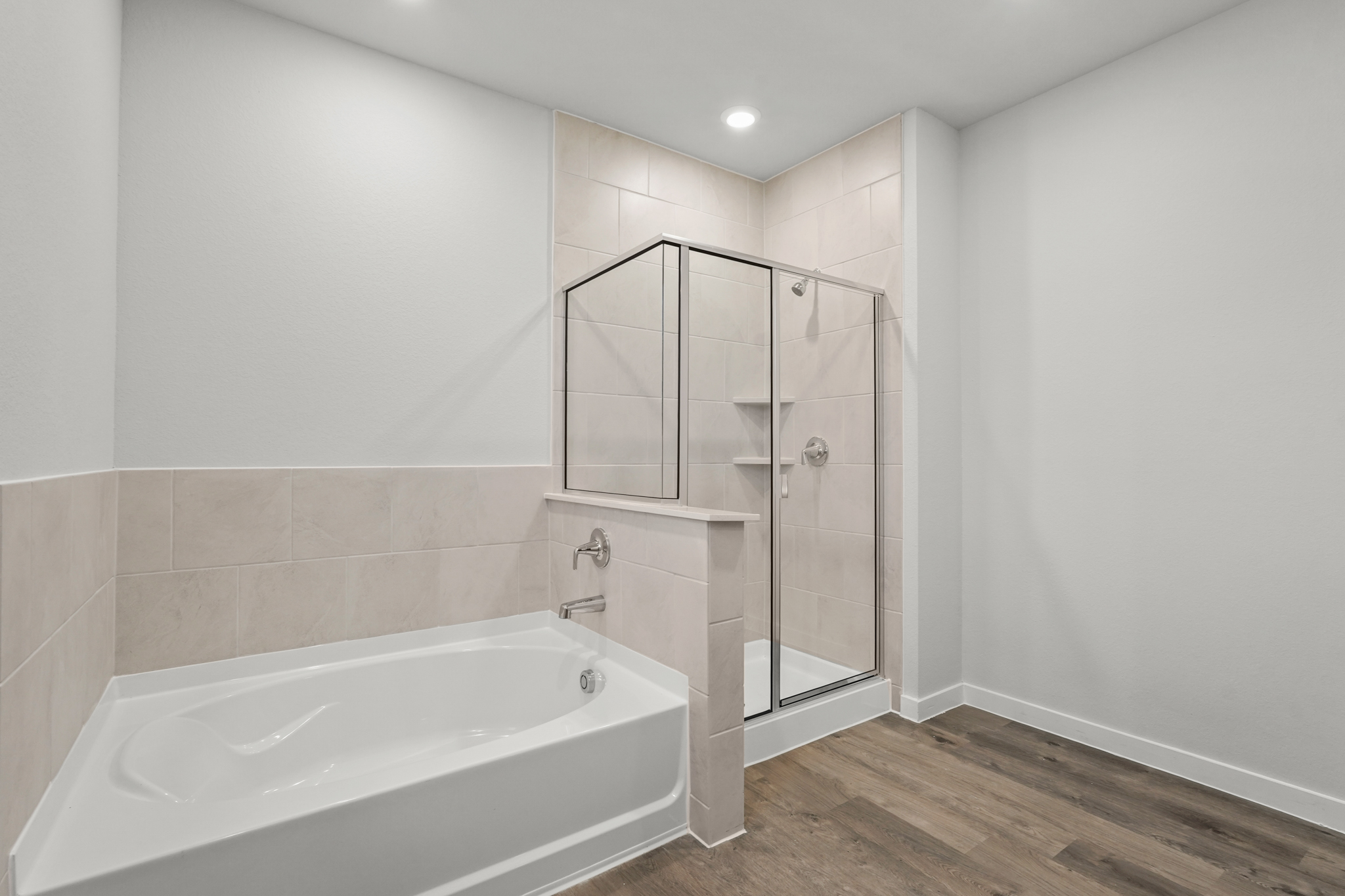 A bathroom with a glass shower.