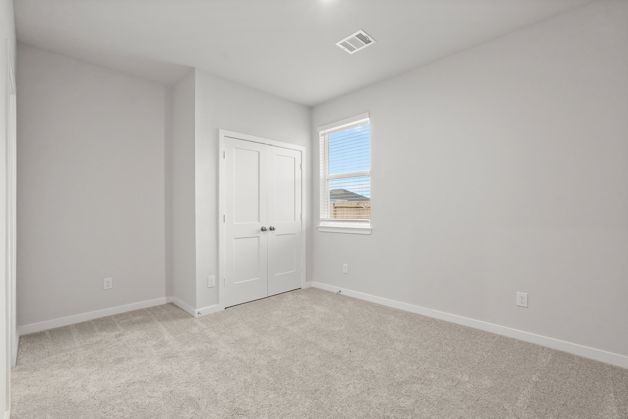 A room with white doors.