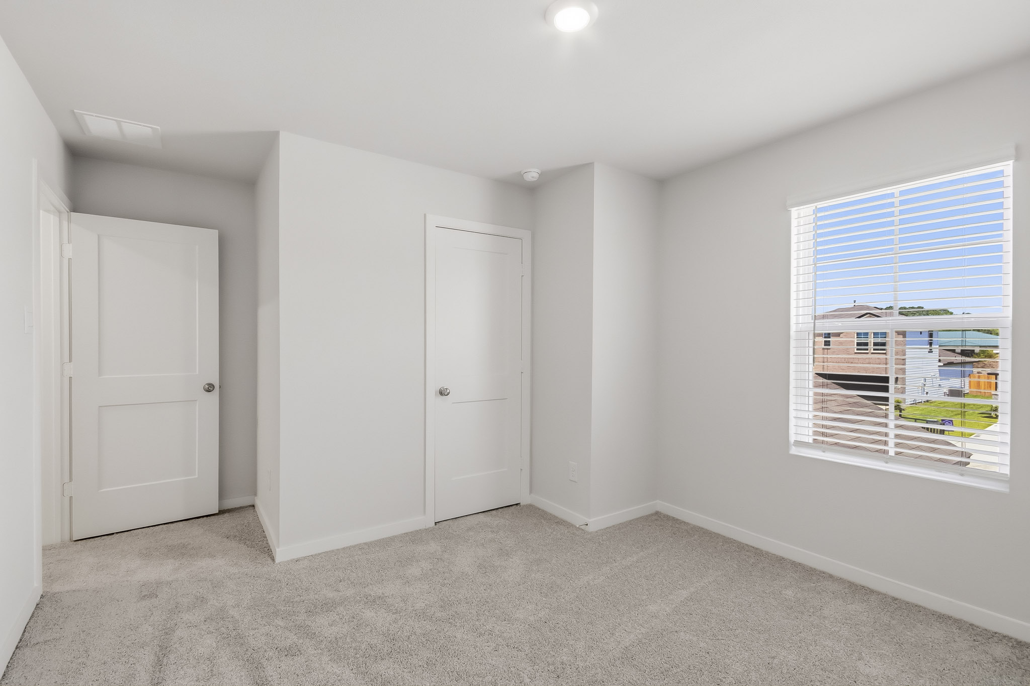 A room with white doors.