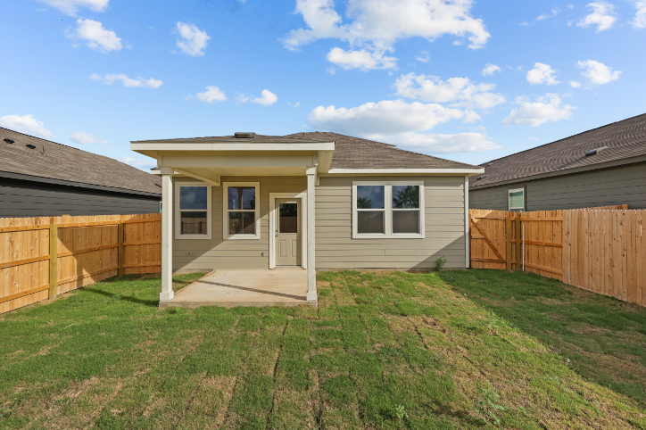 A house with a fence around it.