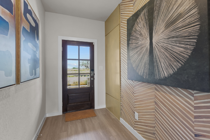 A room with a door and a window.