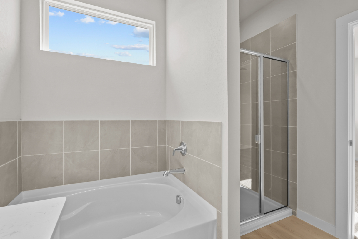 A bathroom with a glass shower.