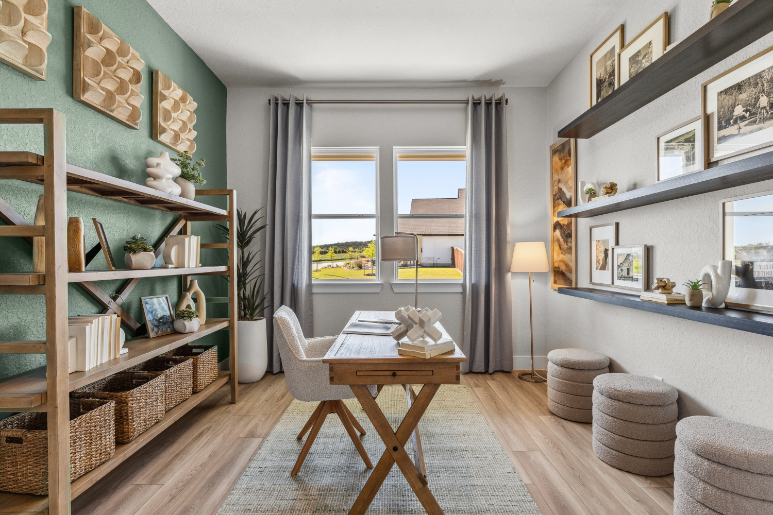 A room with a table and chairs.