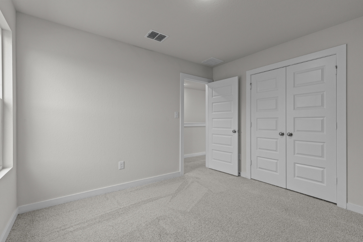 A room with white doors.