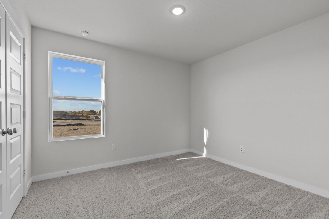 A room with a large window.