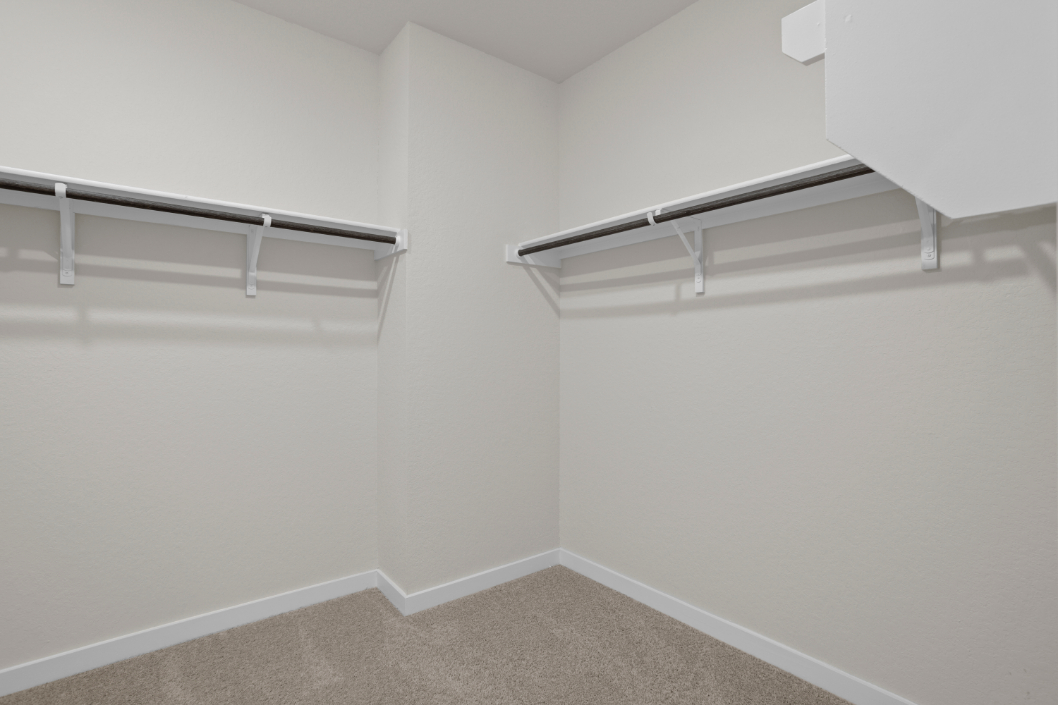 A white staircase in a room.