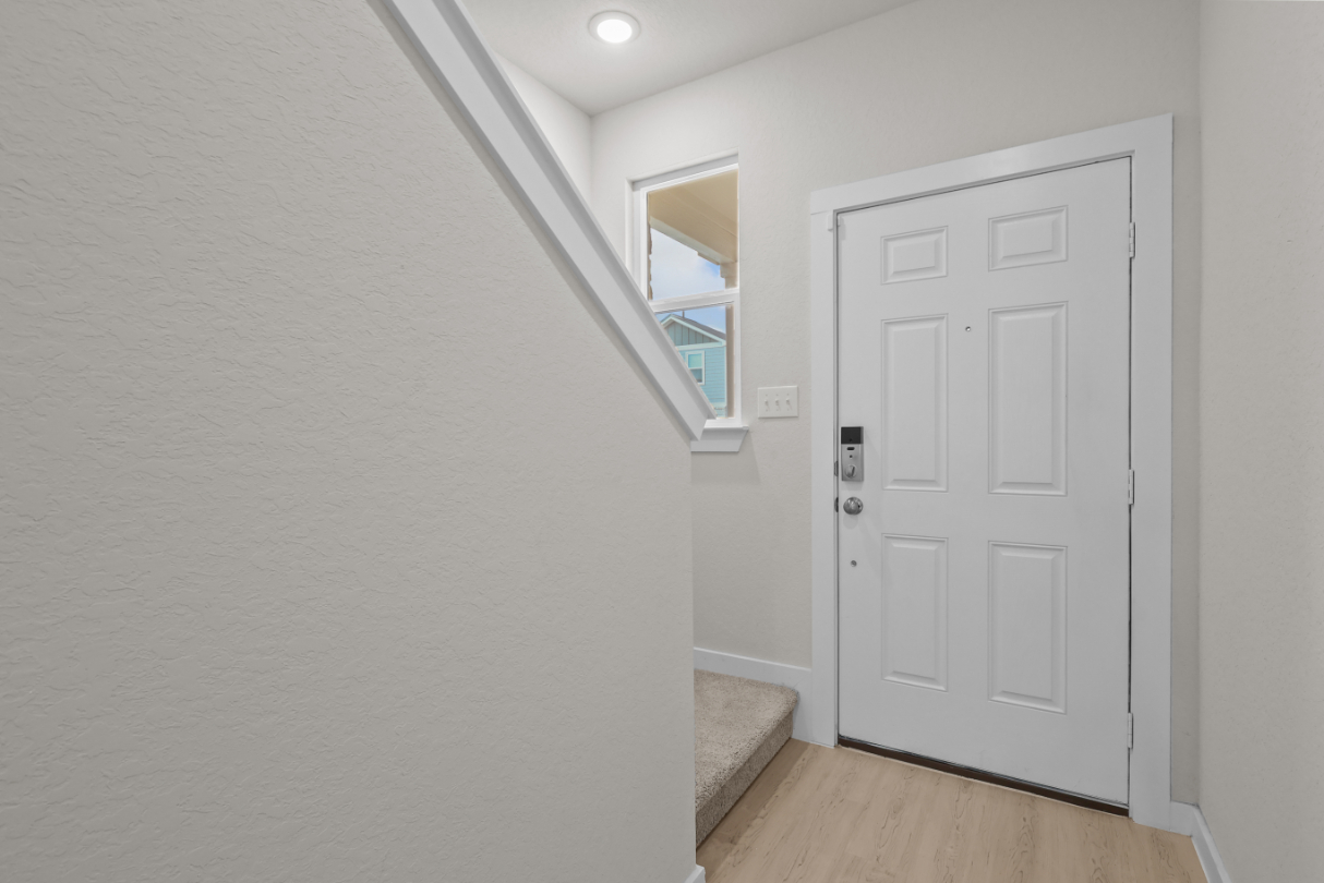A white door in a room.