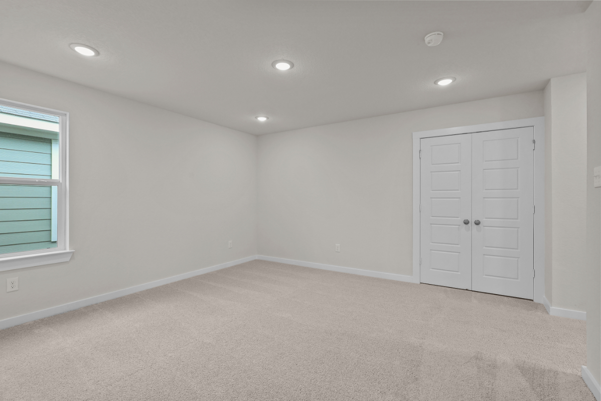 A room with white doors.