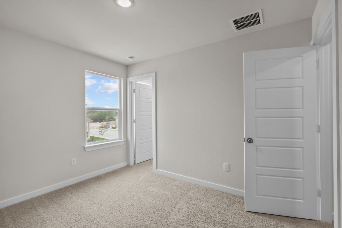 A room with white doors.