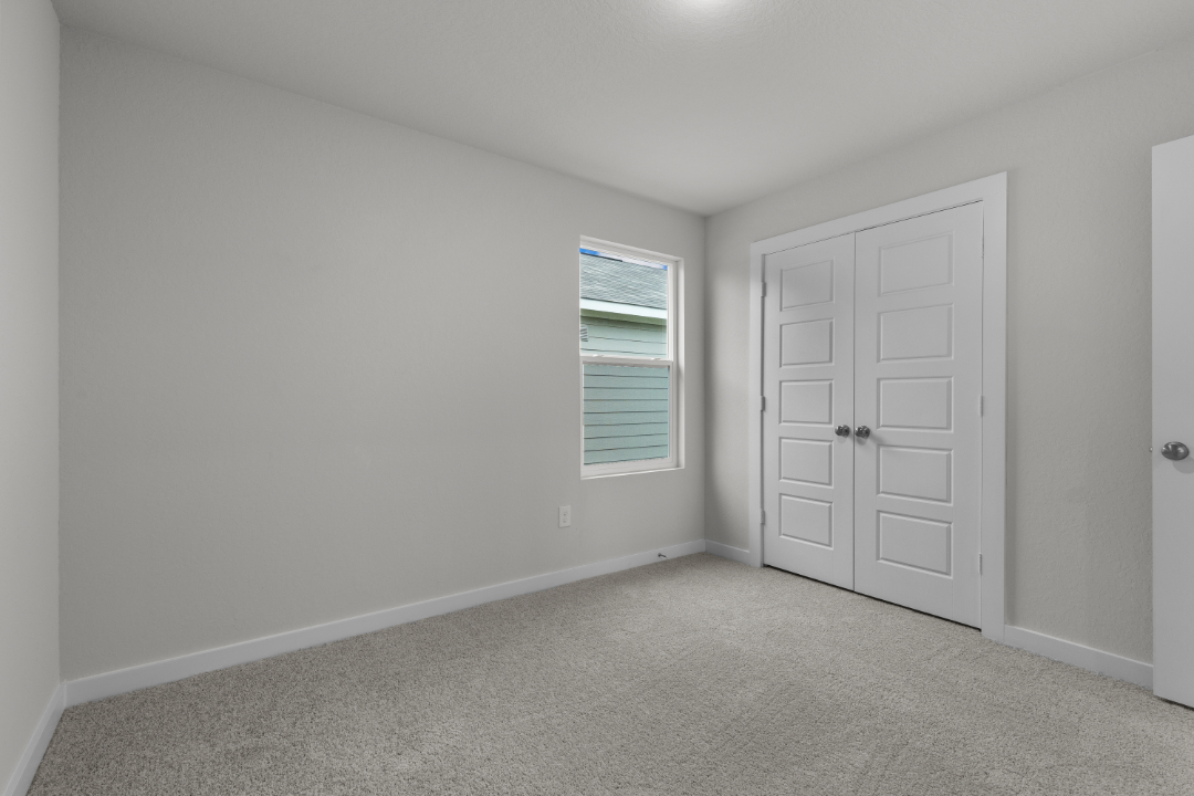 A room with white doors.