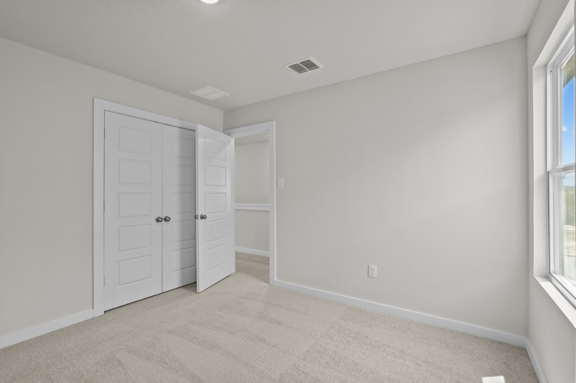 A room with white doors.