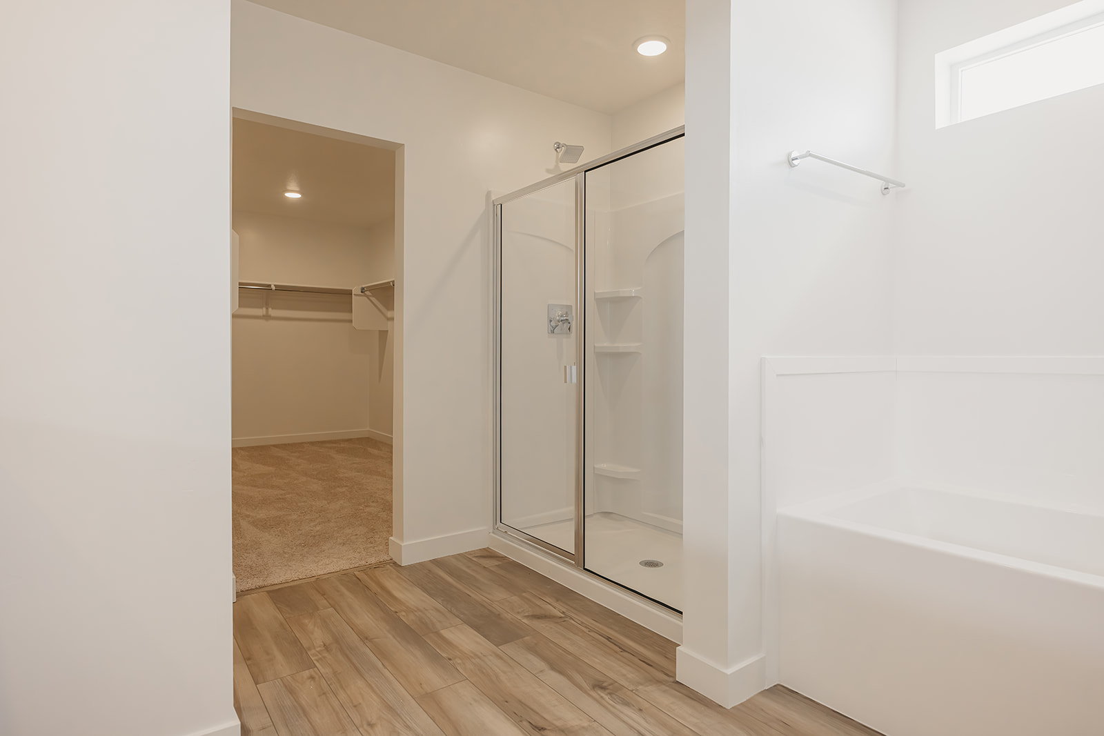A bathroom with a glass shower.