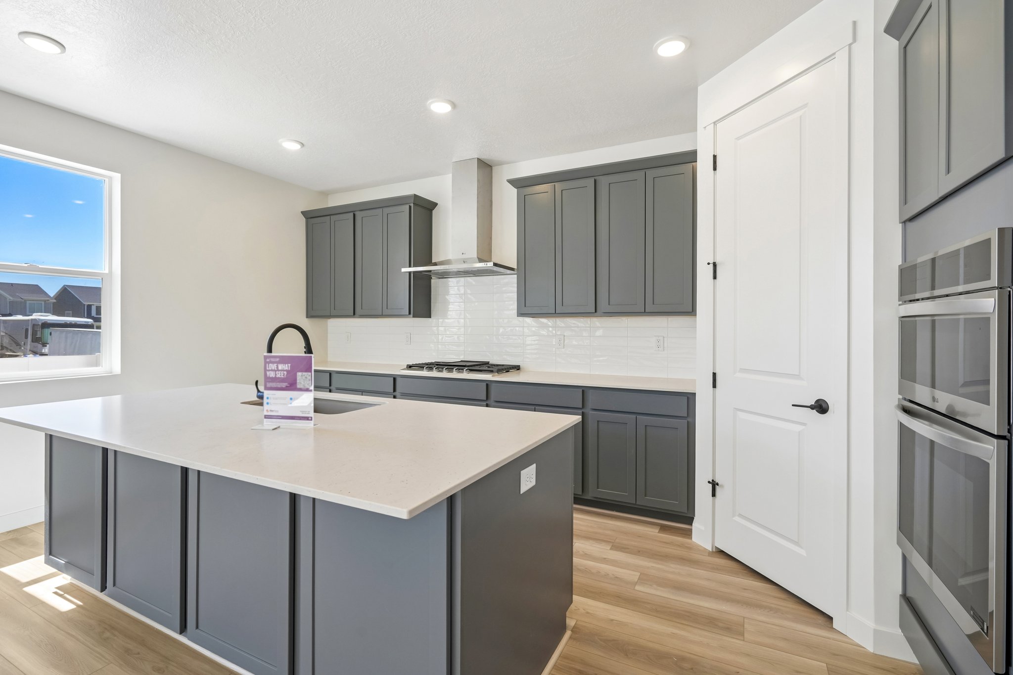 A kitchen with a large island.