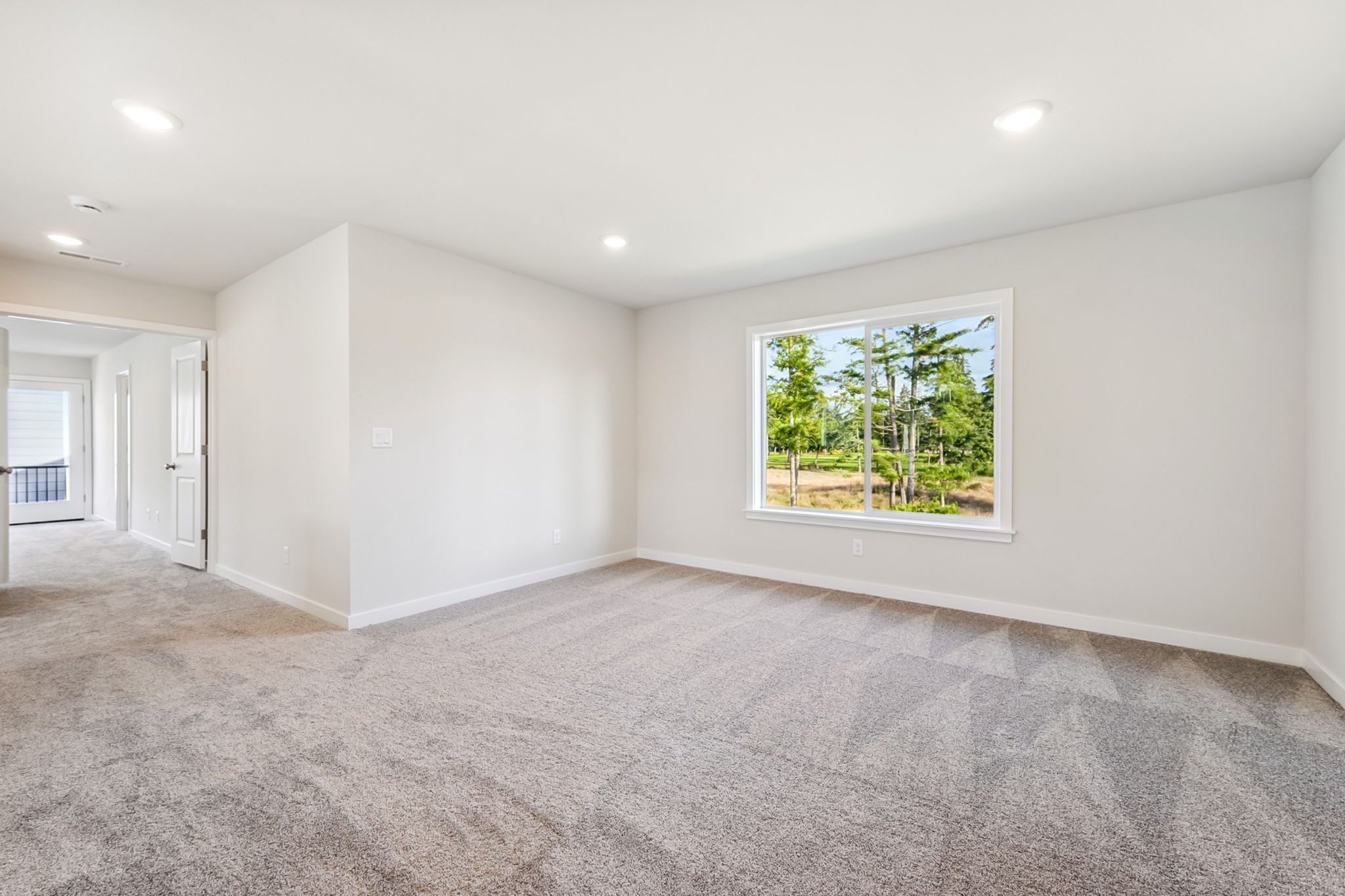 A room with a large window.