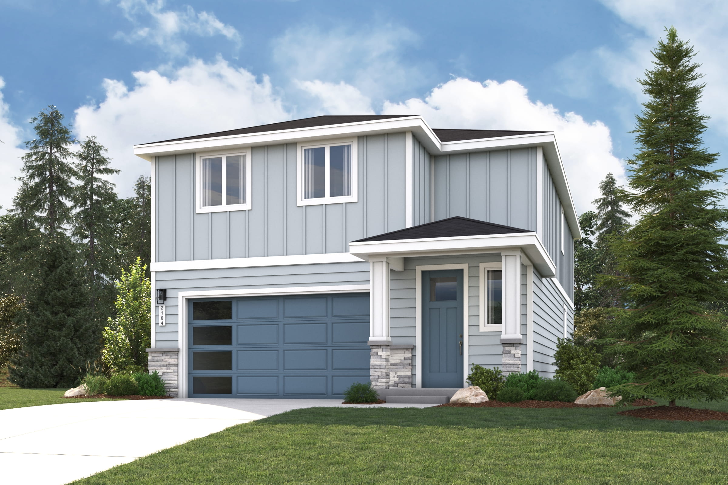 A white house with a garage.