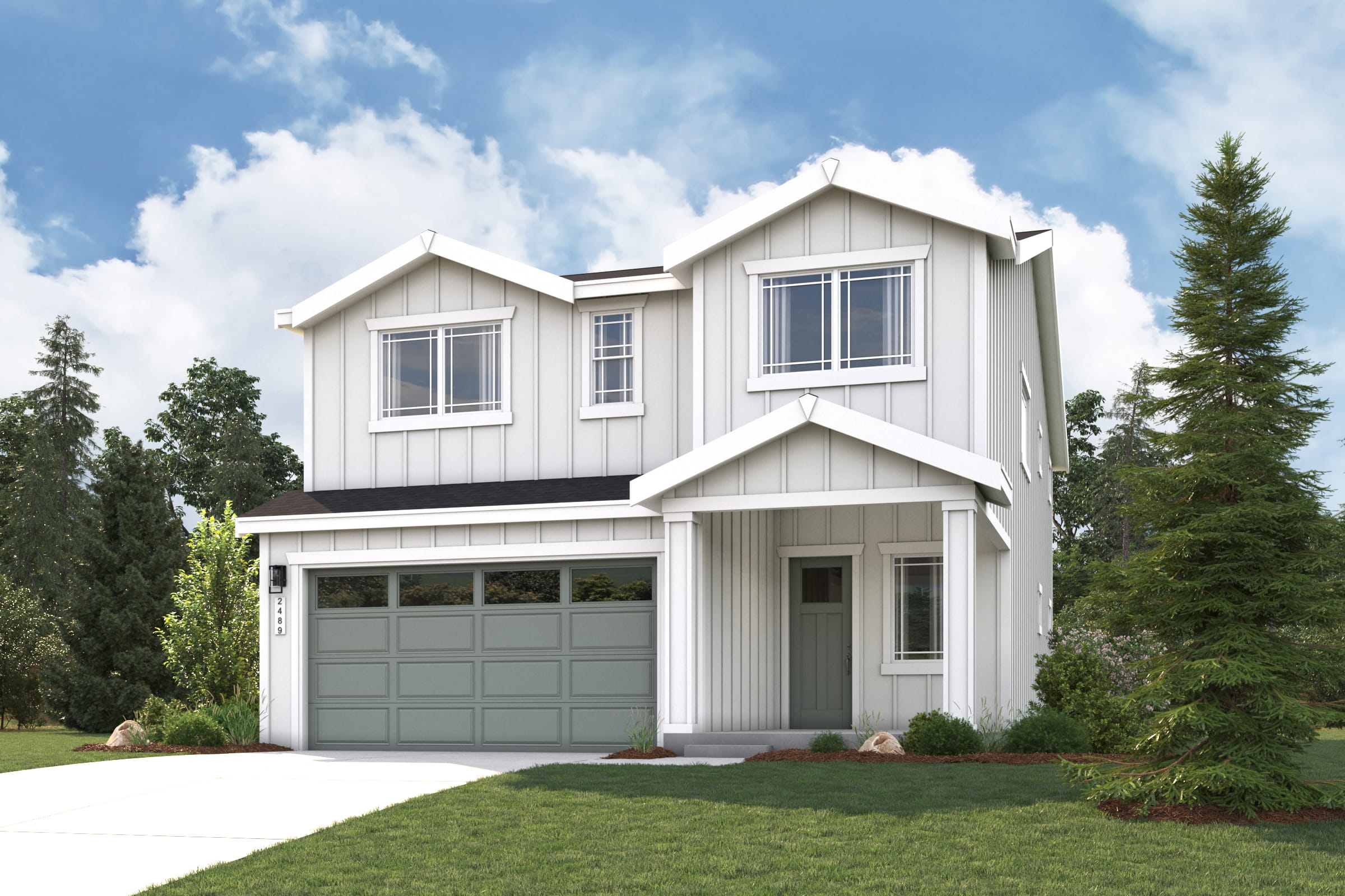 A white house with a garage.