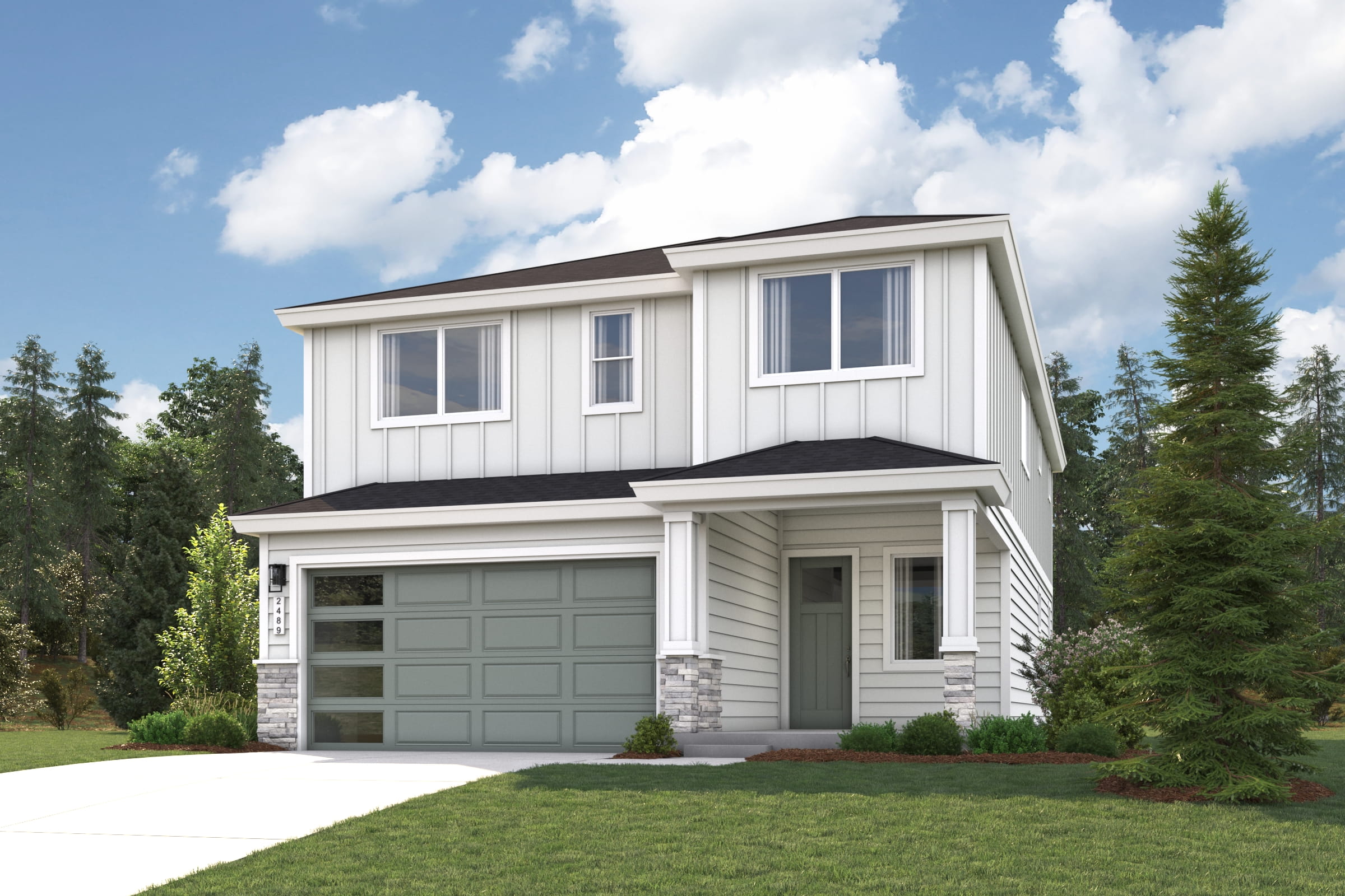A white house with a garage.