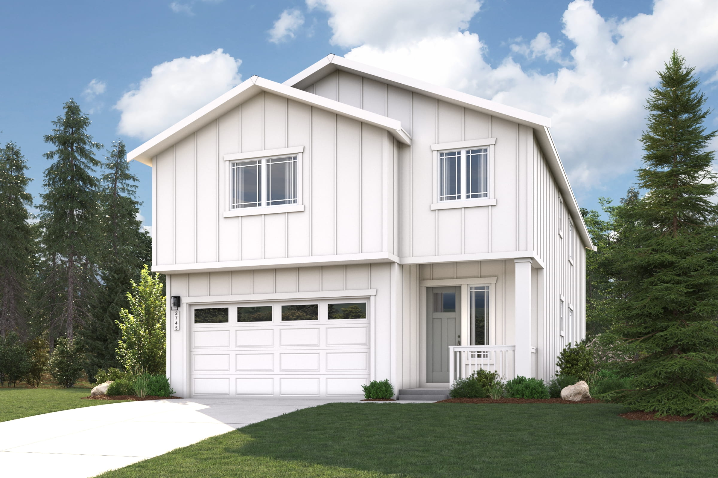 A white house with a garage.