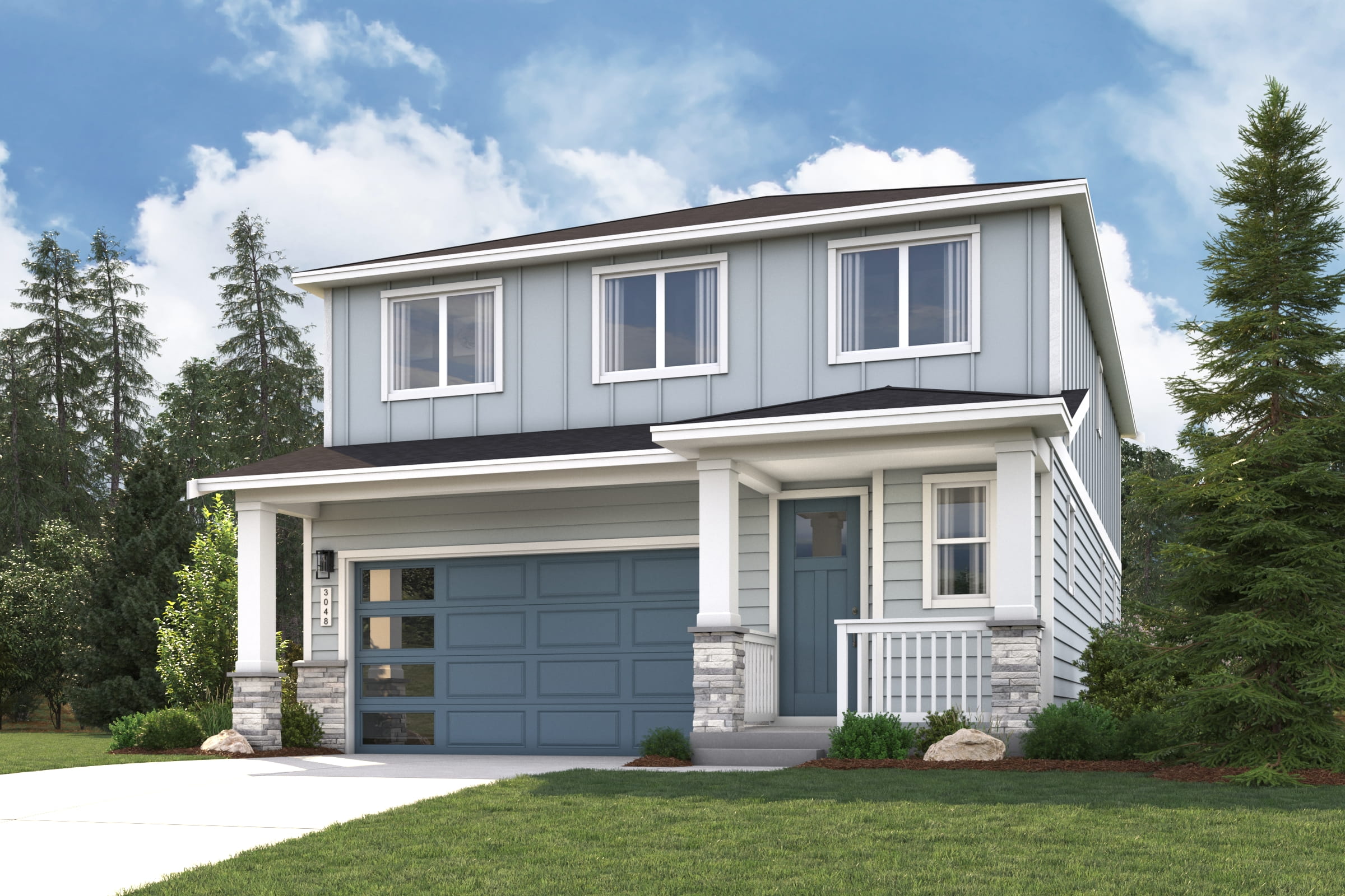 A white house with a garage.