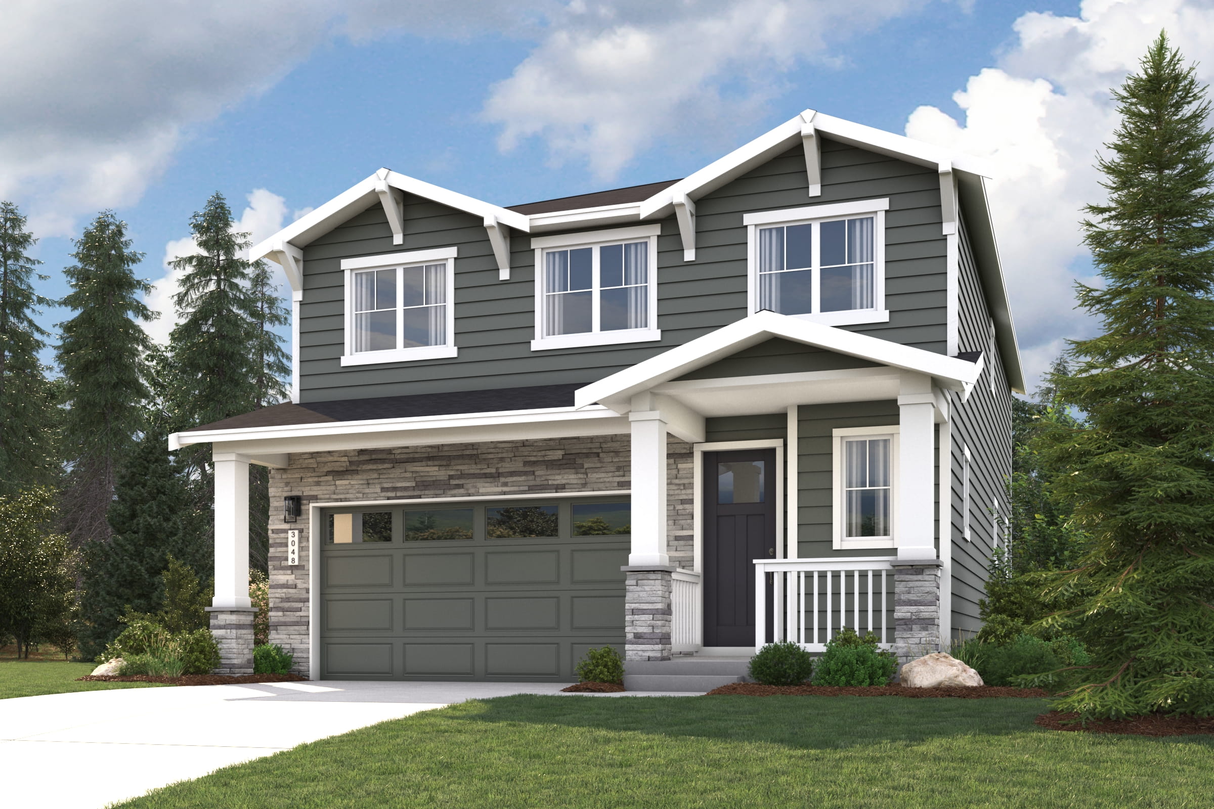 A house with a garage and trees.